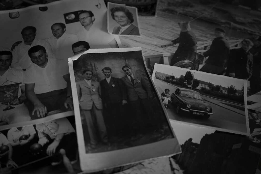 Archive room with old photographs and documents about classic automobiles