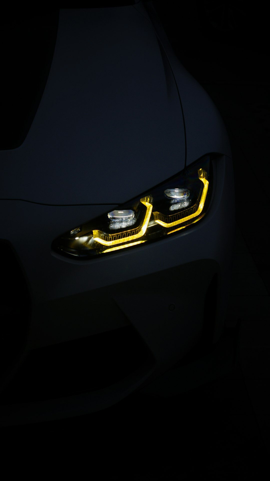 High performance electric hypercar with glowing light details at night